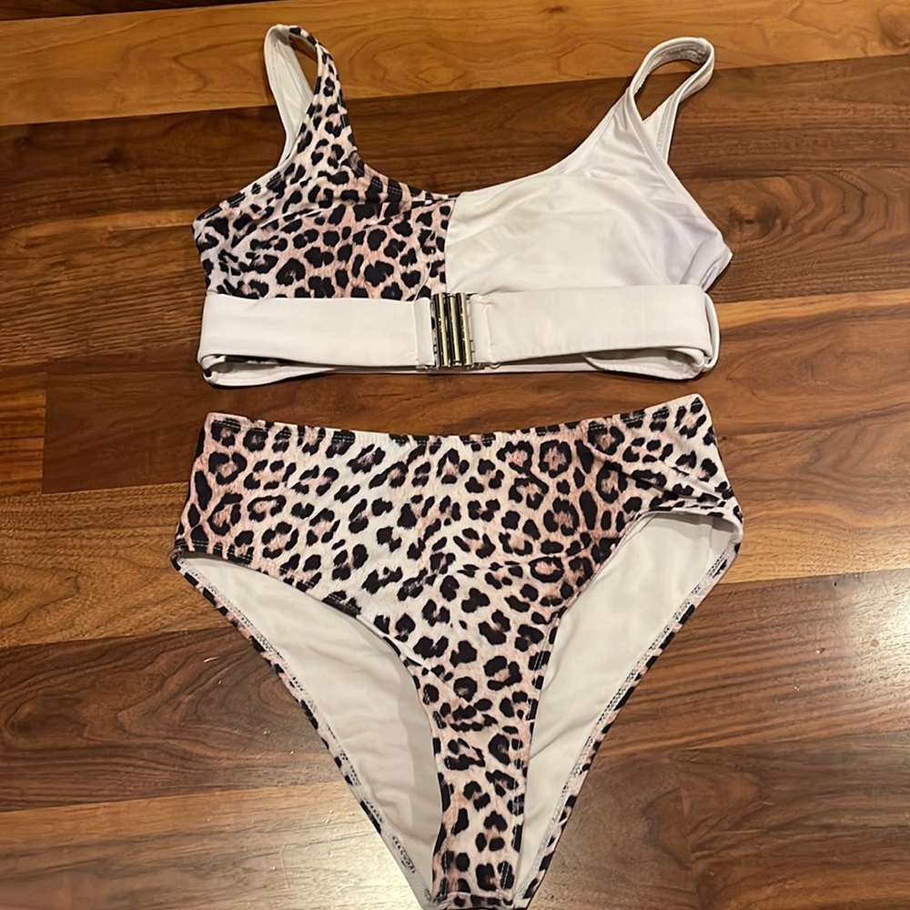Used cheetah and white swimsuit